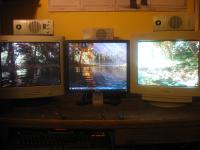 Photo of my triple-monitor wallpaper setup