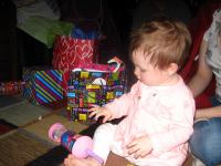 Kendall opening her first birthday gifts