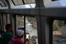 Colorado River whitewater rapids as seen from inside the California Zephyr observation car